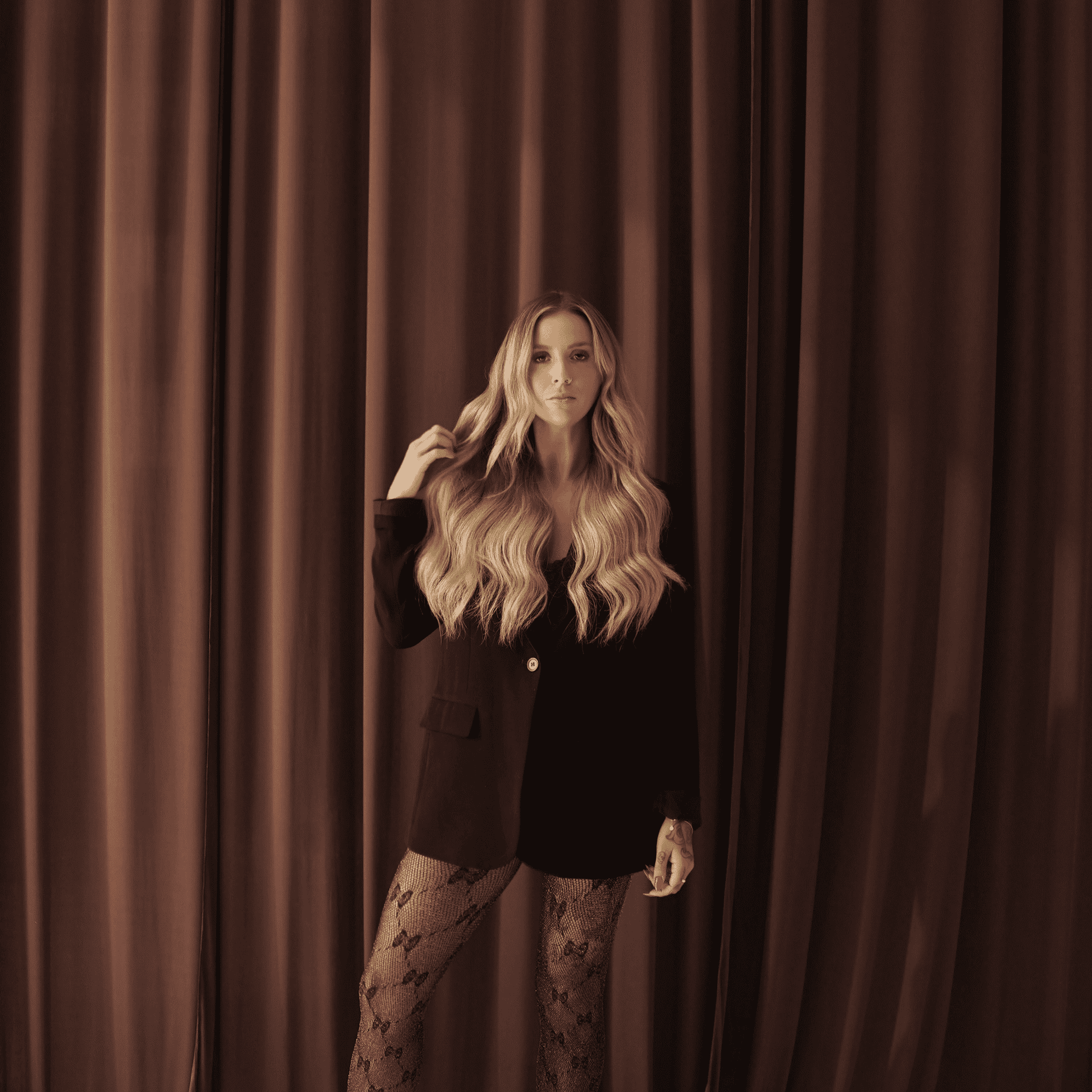 Portrait of Elise Way, a professional stylist at Salt and Waves Salon, showcasing their expertise and style.