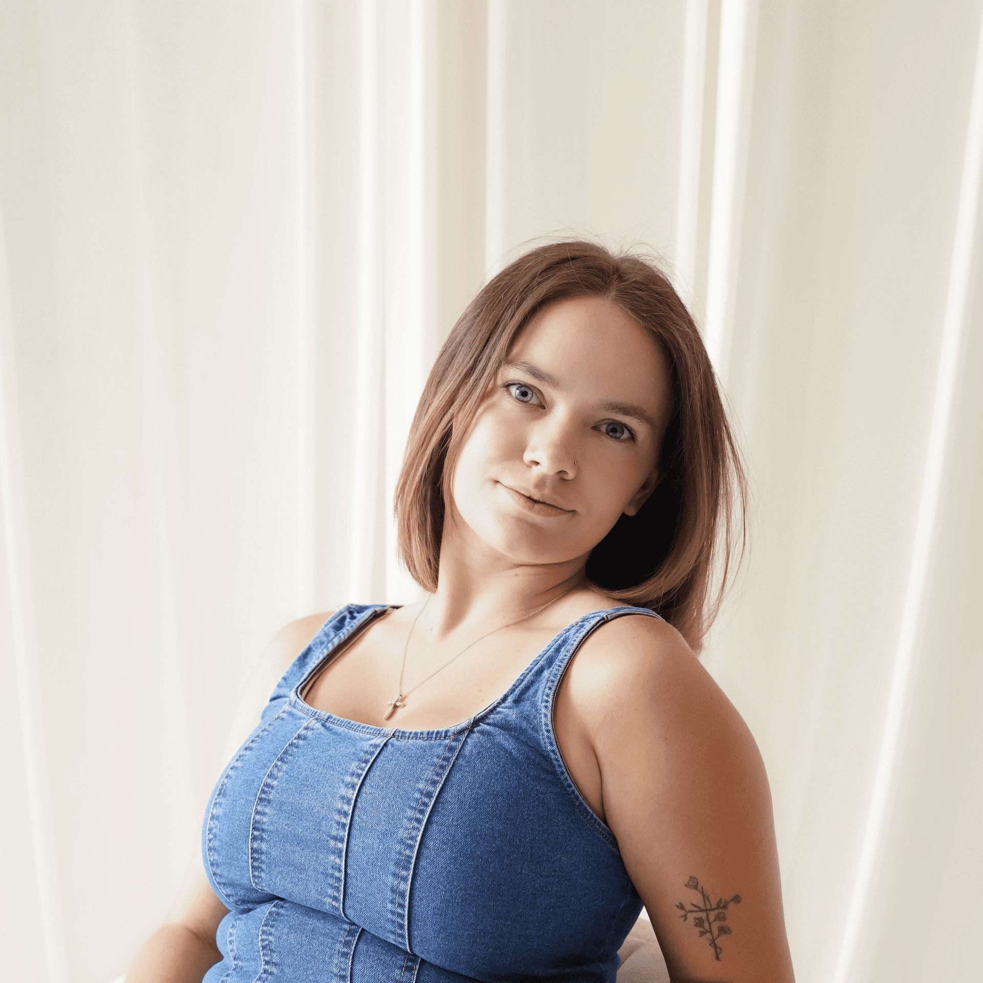 Portrait of Kara Gunter, a professional stylist at Salt and Waves Salon, showcasing their expertise and style.
