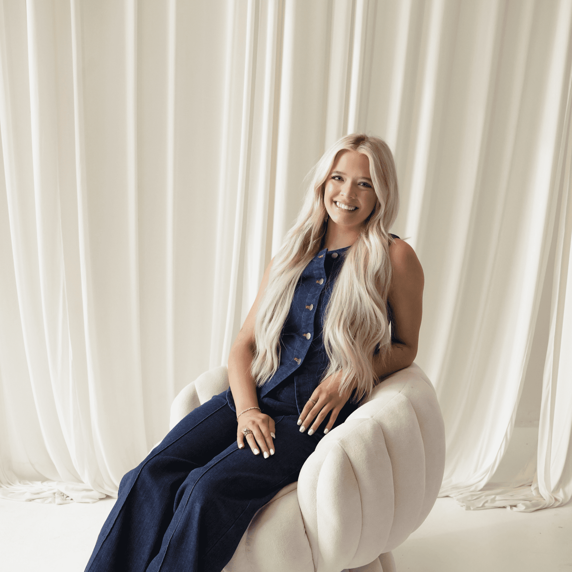 Portrait of Macenzie Sanders, a professional stylist at Salt and Waves Salon, showcasing their expertise and style.