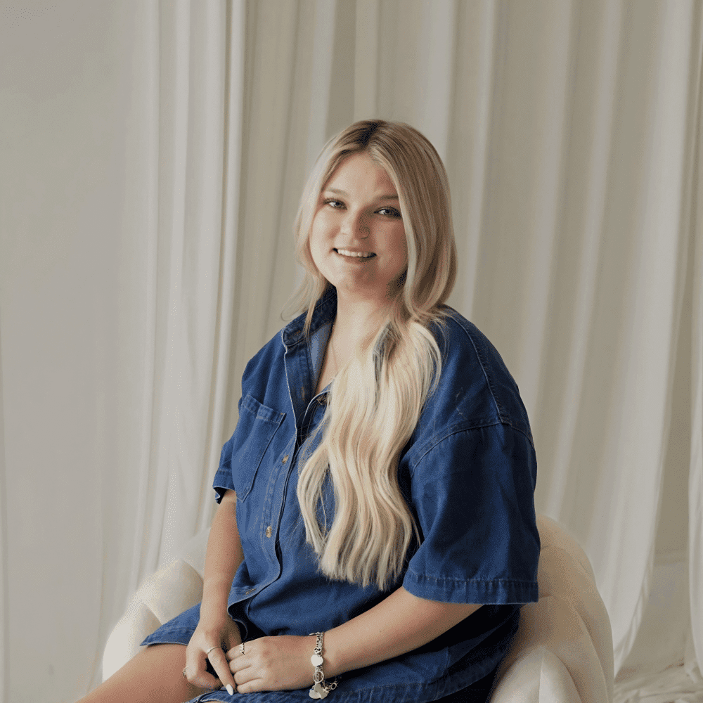 Portrait of Madison Horne, a professional stylist at Salt and Waves Salon, showcasing their expertise and style.