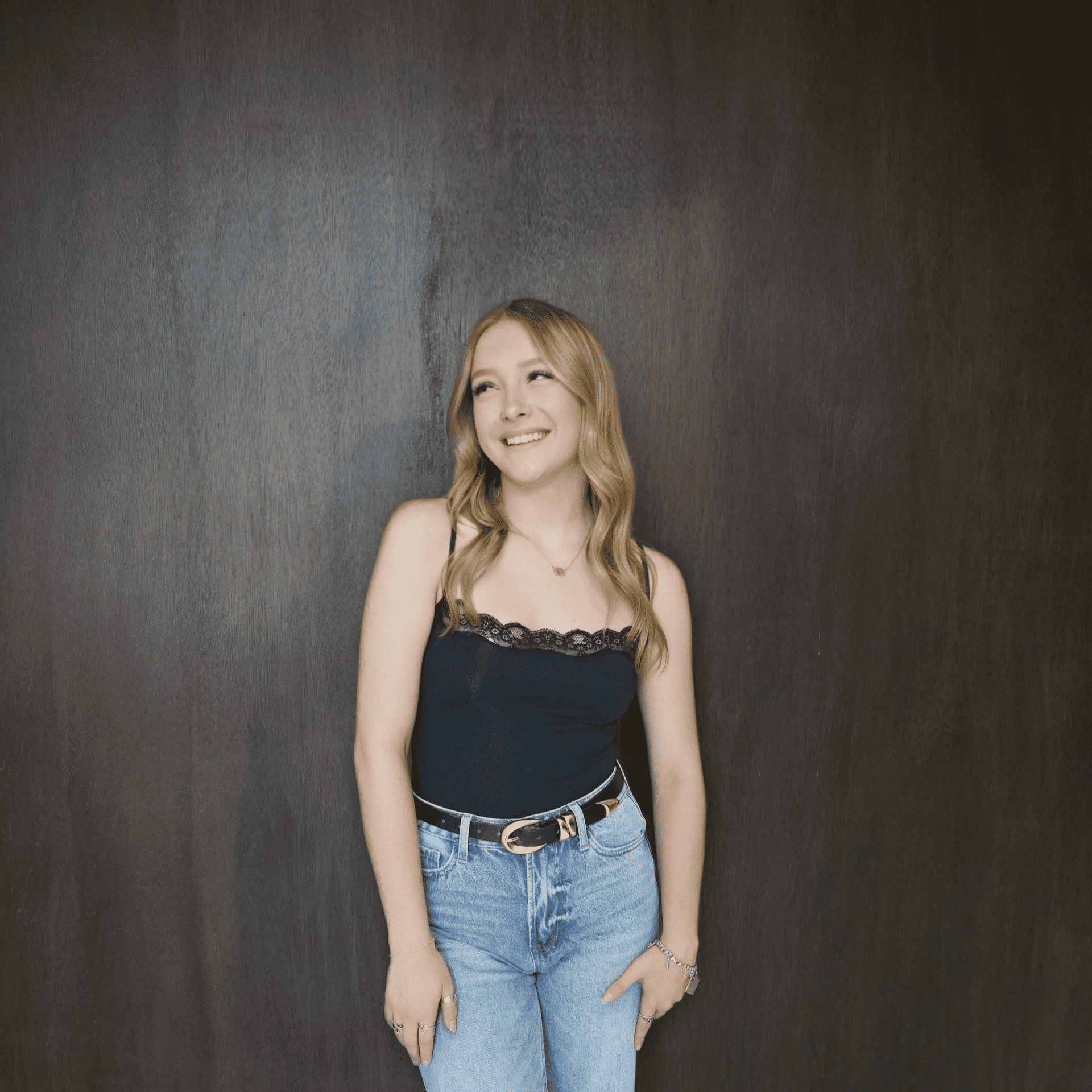 Portrait of Kendall Haley, a professional stylist at Salt and Waves Salon, showcasing their expertise and style.