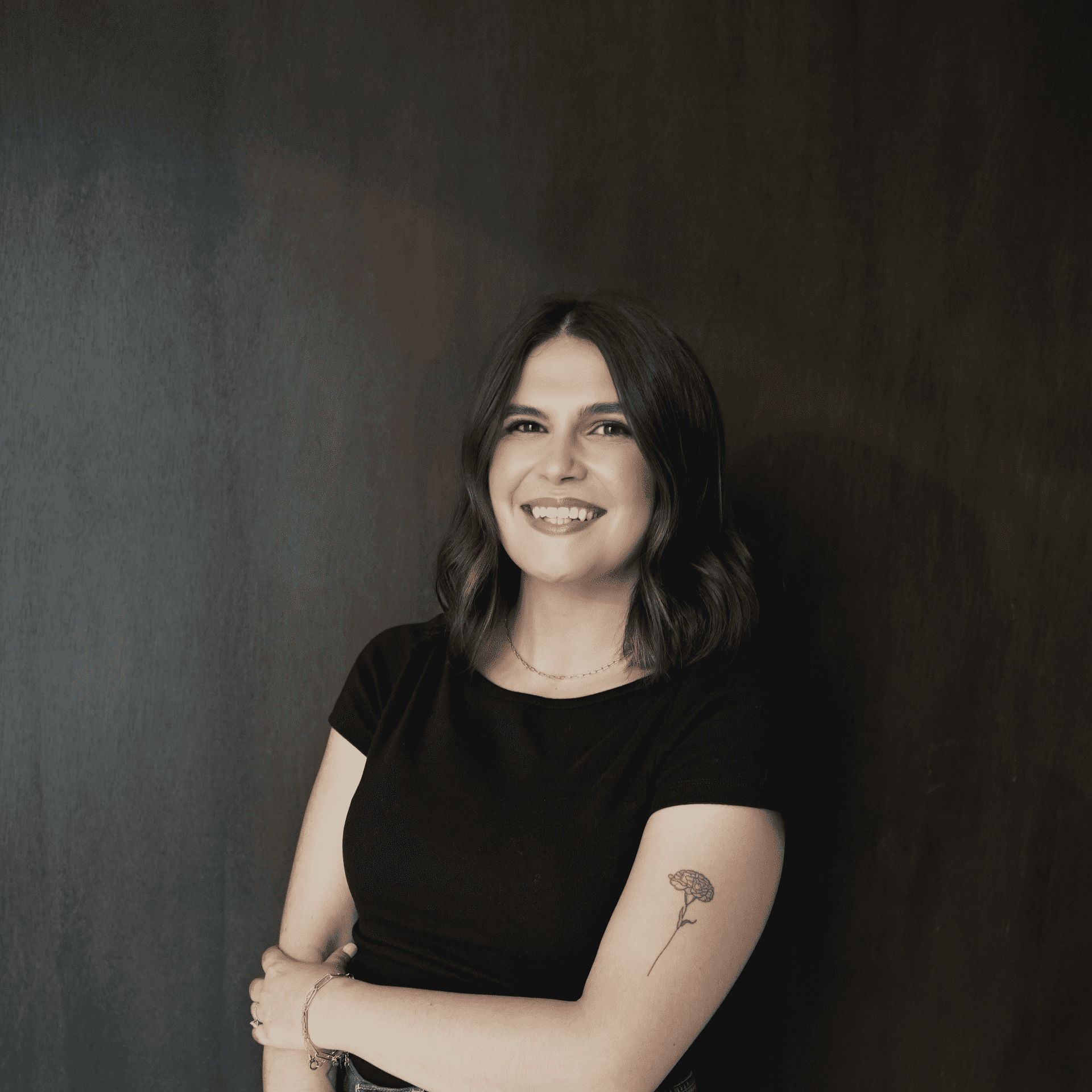 Portrait of Sarah Gonzalez, a professional stylist at Salt and Waves Salon, showcasing their expertise and style.