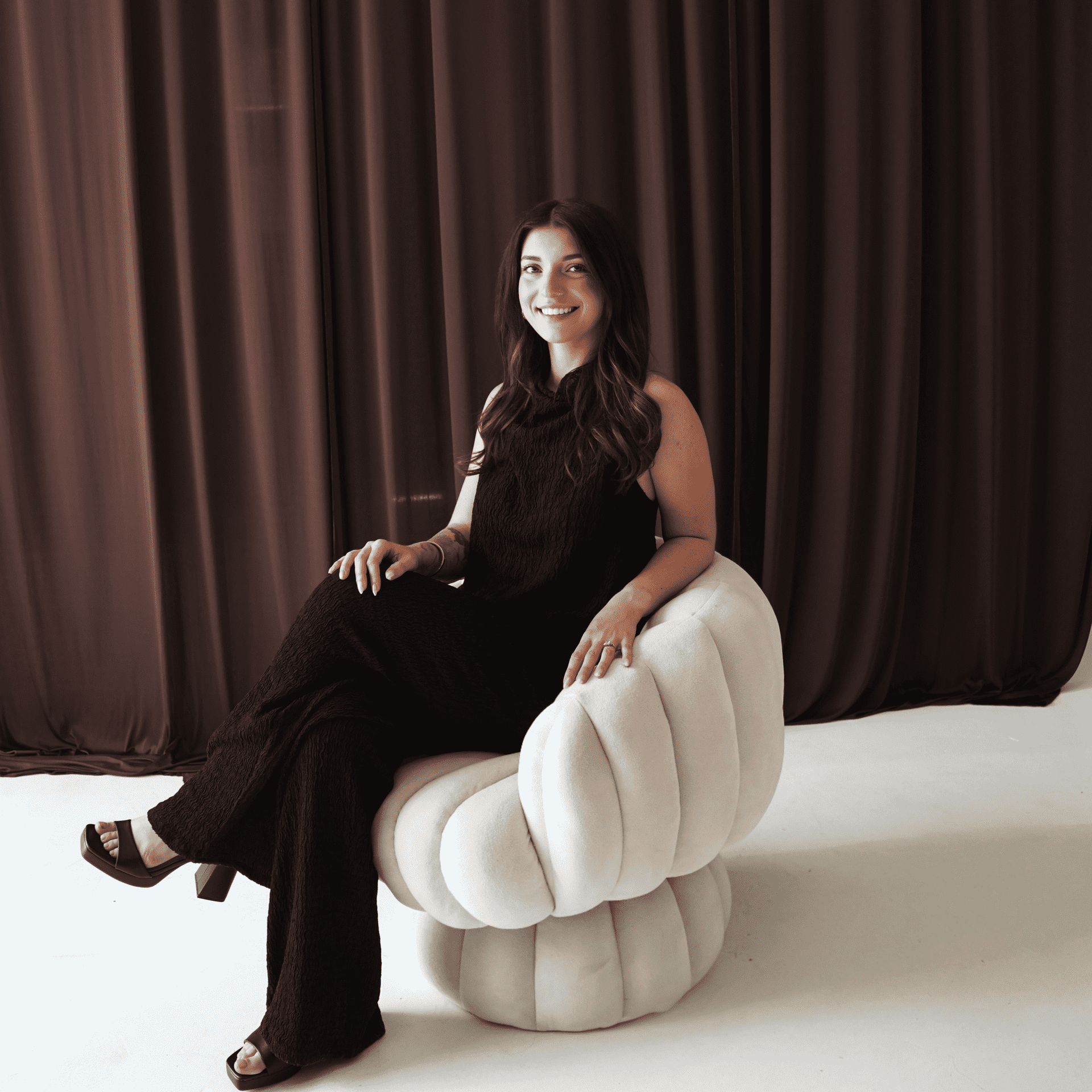 Portrait of Anna Shanks, a professional stylist at Salt and Waves Salon, showcasing their expertise and style.