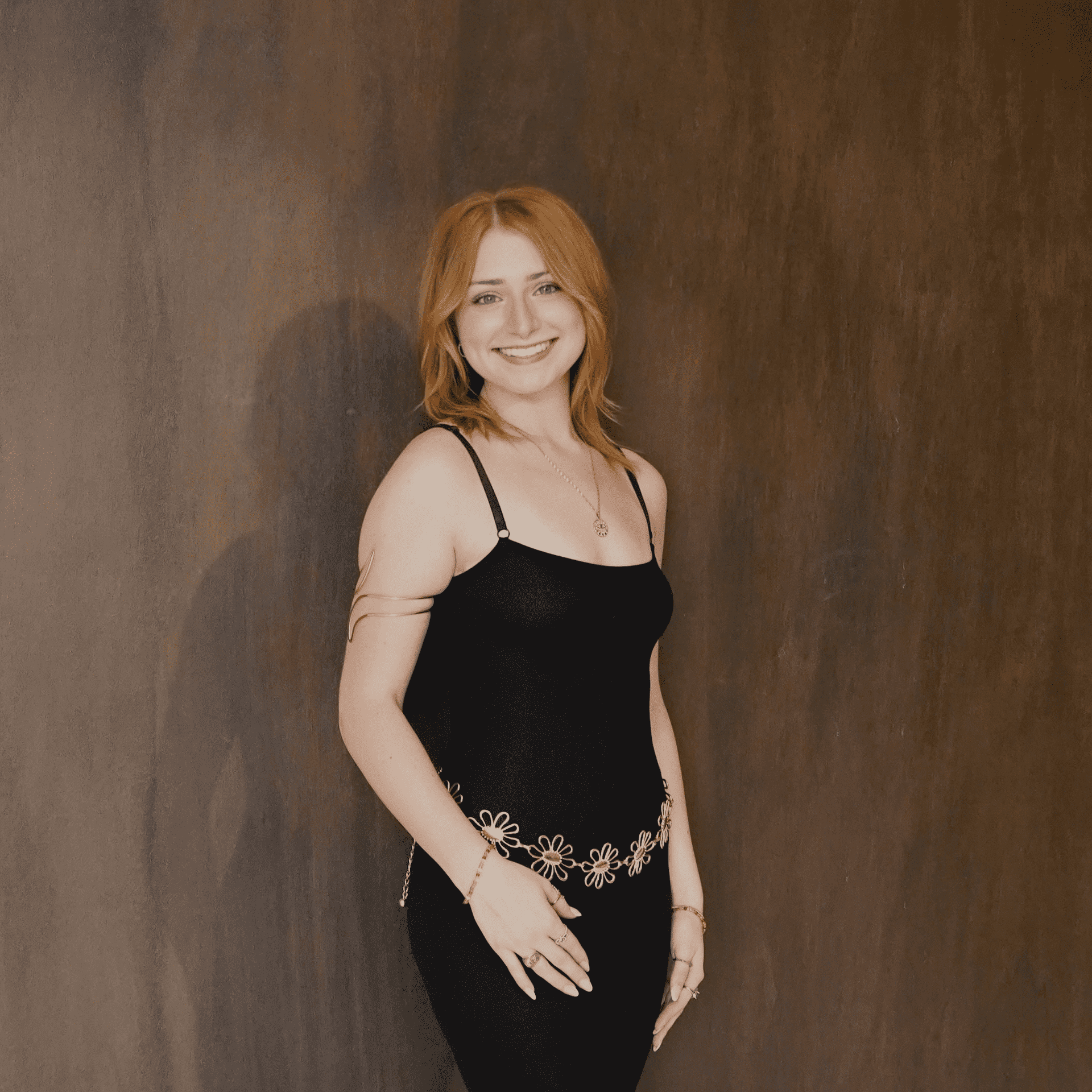 Portrait of Lydya Finley, a professional stylist at Salt and Waves Salon, showcasing their expertise and style.